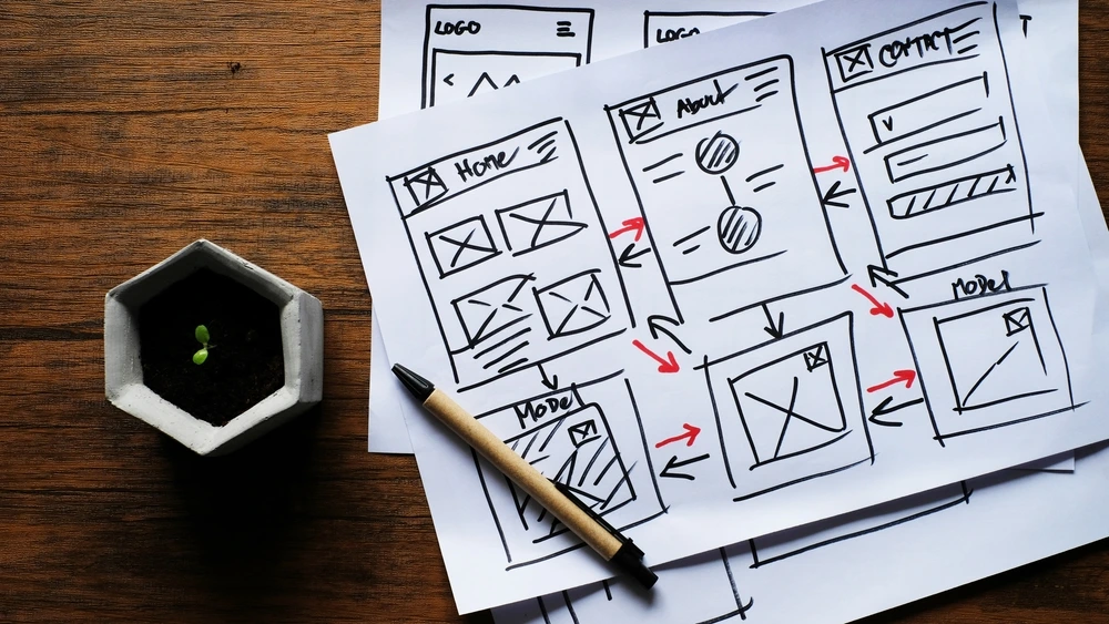 Photo of hand-sketched website wireframes