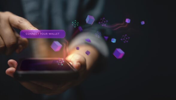 A closeup of an online shopper adding their digital wallet information to their smartphone